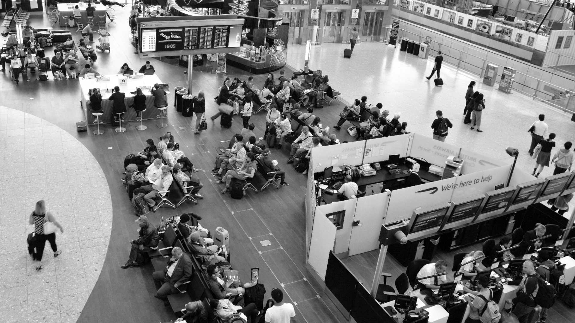 "Heathrow Terminal 5A departures" by Mike McBey, used under CC BY 2.0 / Cropped, desaturated and resampled from original